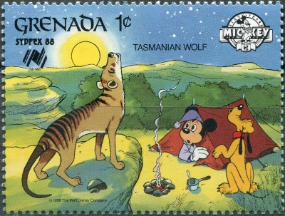 Гренада. 1988. Тасманийский волк, Микки Маус и Плуто (Почтовая марка. MNH OG)